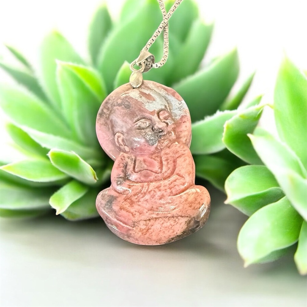 Carved pink stone Buddha pendant necklace. Sterling silver chain. Spiritual zen!